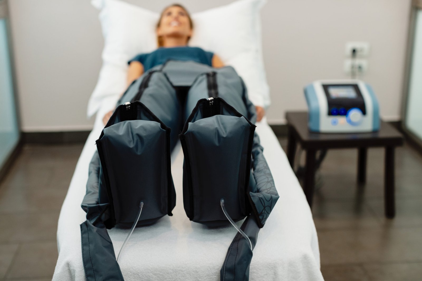 Close-up of pressotherapy treatment at spa center.